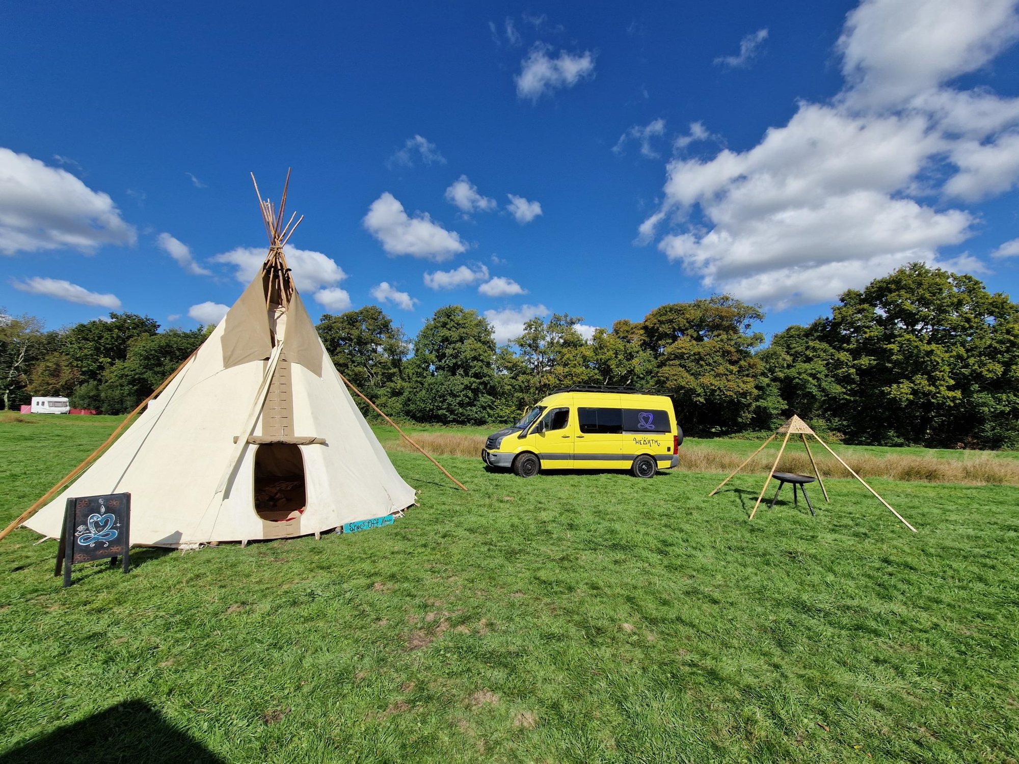 Tipi, van and fire bowl